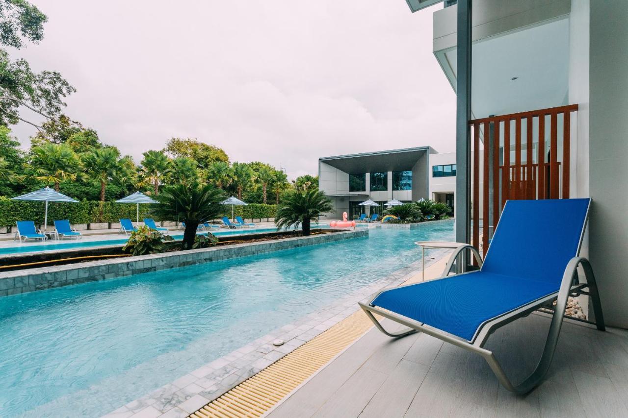 Seabed Grand Hotel Phuket - Sha Extra Plus Экстерьер фото A poolside chaise longue