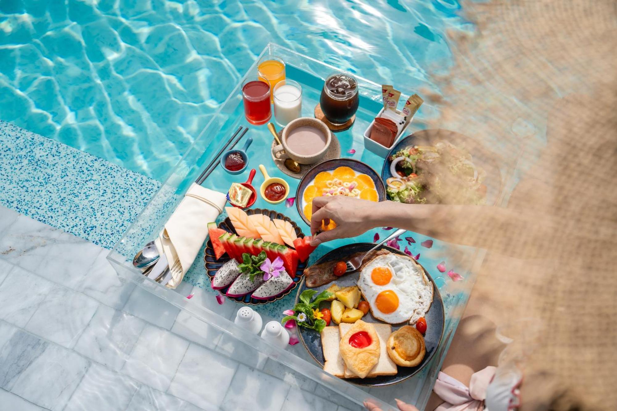 Seabed Grand Hotel Phuket - Sha Extra Plus Экстерьер фото A floating breakfast at a resort in Bali, Indonesia